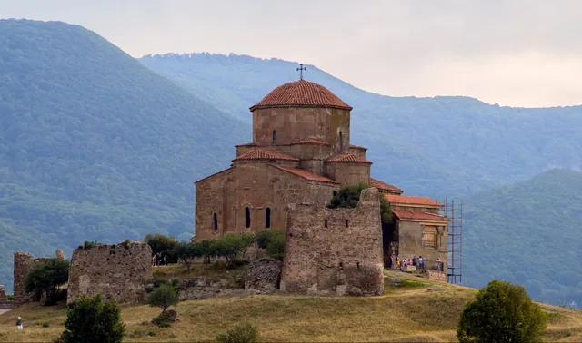 Jvari church and the remains of fortification walls on the hilltop